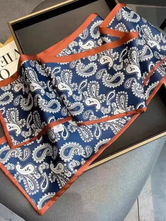 Blue paisley ribbon gift