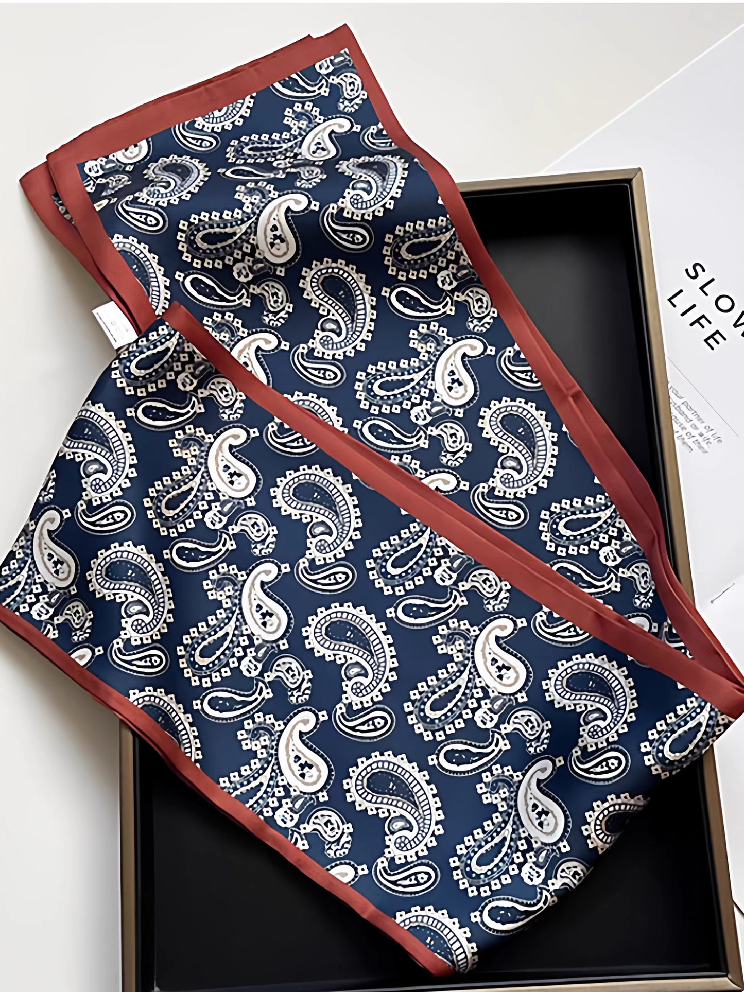 Blue paisley ribbon gift