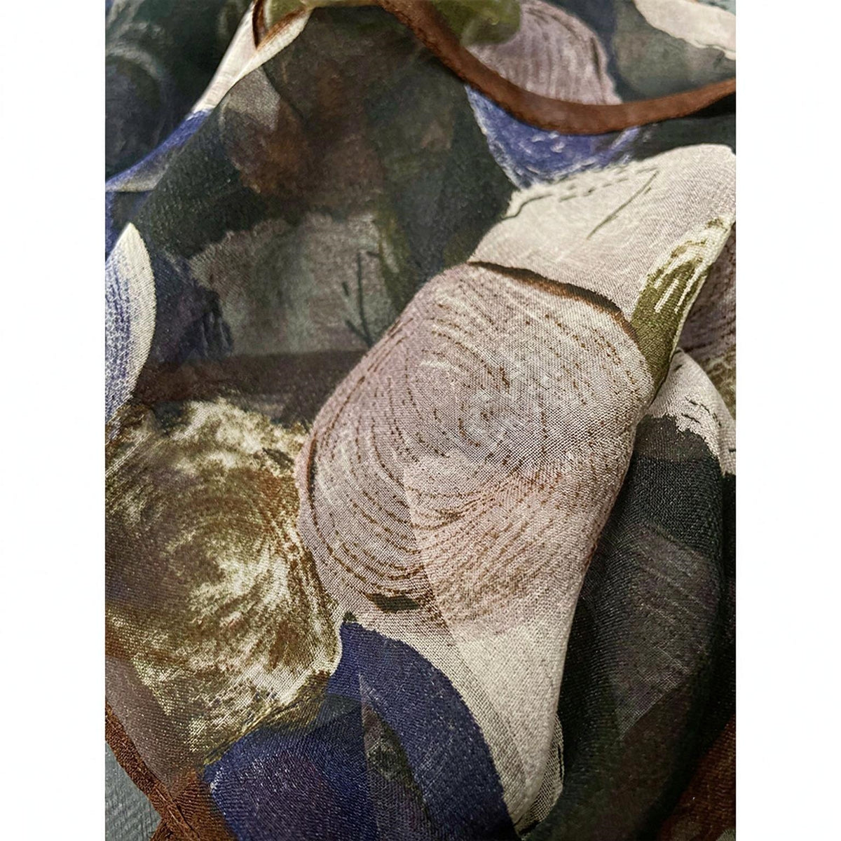 Lightweight, colorful, elongated scarf/shawl